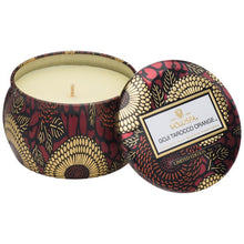 voluspa candle in a decorative japanese inspired tin orange goji